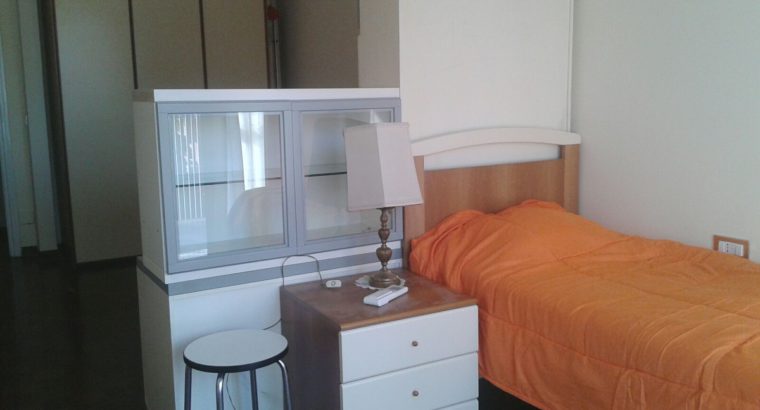 Milan, Bed in a shared room with one female guest